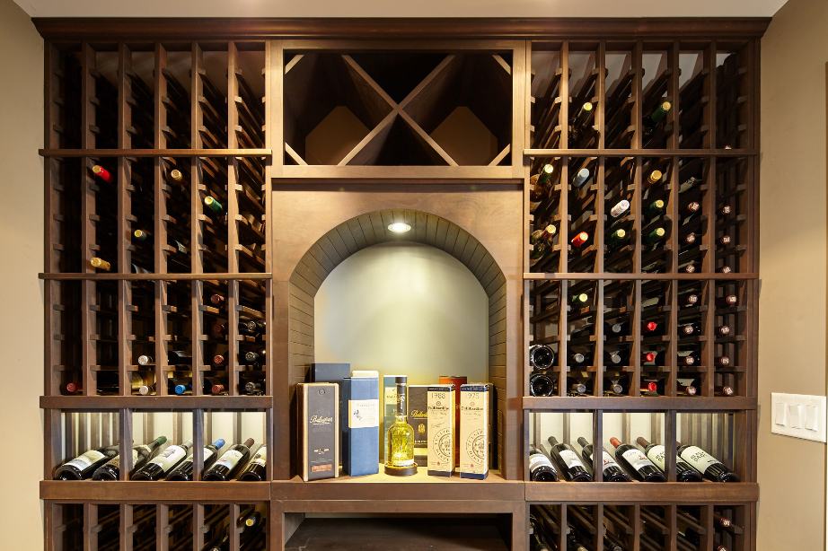 This Wine Cellar Lighting Illuminates the Archway Display in one of Our Projects in Orange County 