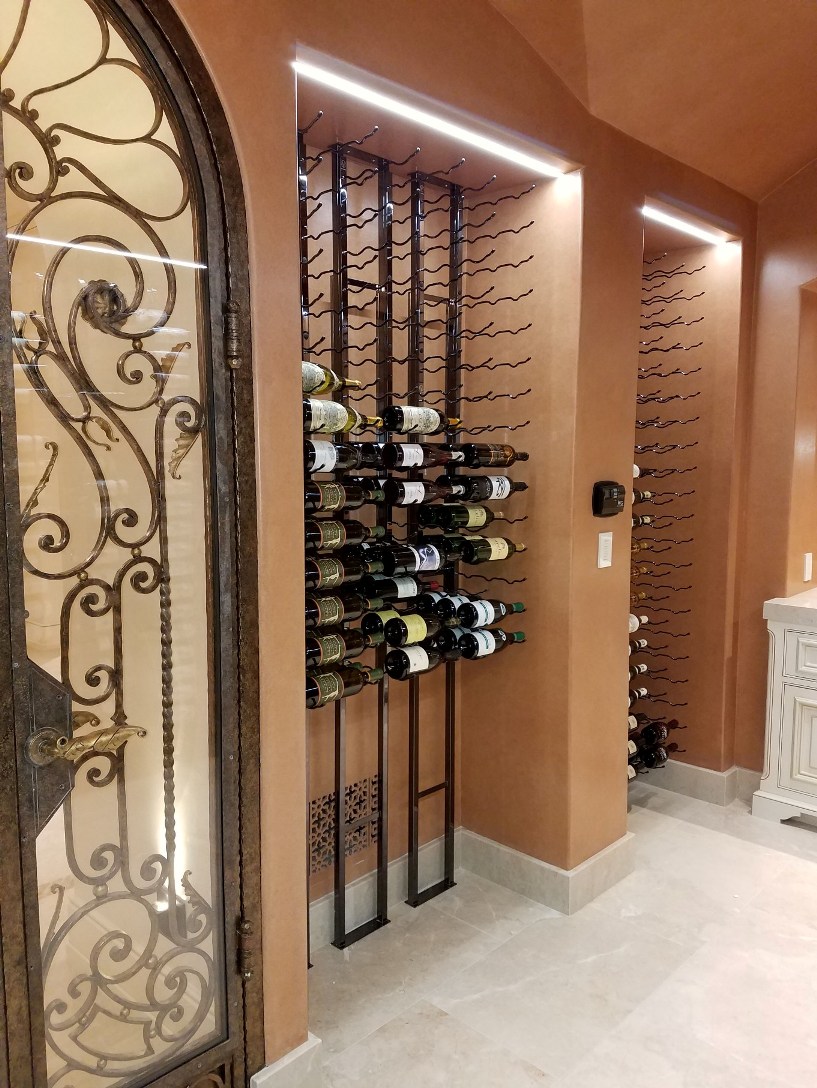 Elegant Residential Custom Wine Cellar with Metal Wine Racks Designed by Orange County Experts