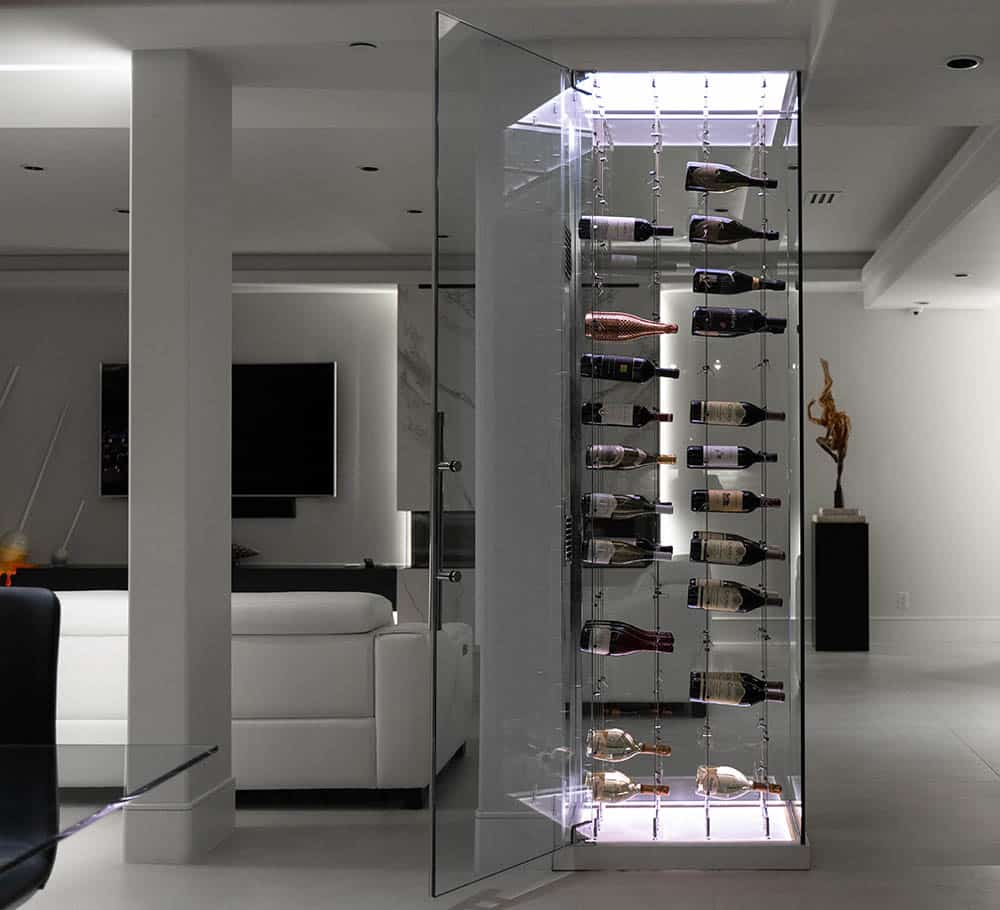 A modern home wine cellar with cable wine racking