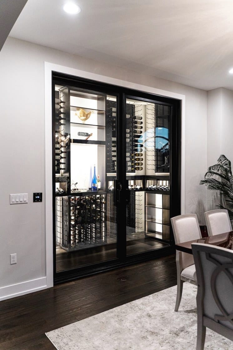 This modern glass wine cellar has unique features. The wine cellar pictures say it all. 