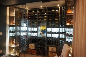 41- Modern wine cellars in Orangr County with  glass wine door
