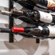 (6) Explore modern wine cellar ideas with metal racking—this layout offers strong visual symmetry while making every bottle easily accessible and beautifully displayed.