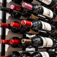 (8) This triple-deep design showcases space-saving modern wine cellar ideas—perfect for collectors who want both volume and aesthetic impact.